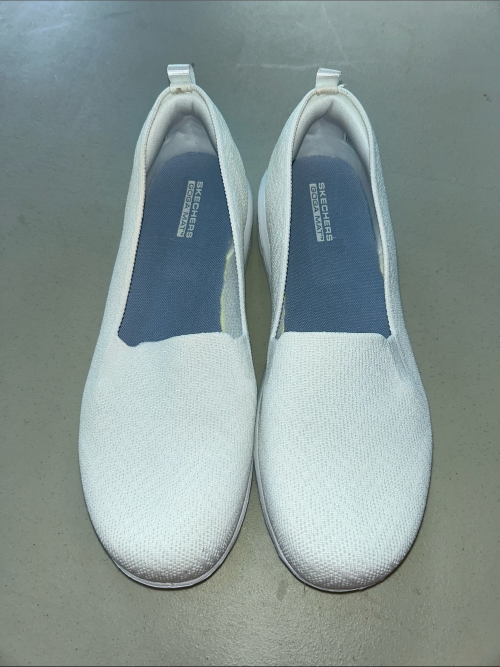 White Skechers Go Walk Slip-On Knit Sneakers